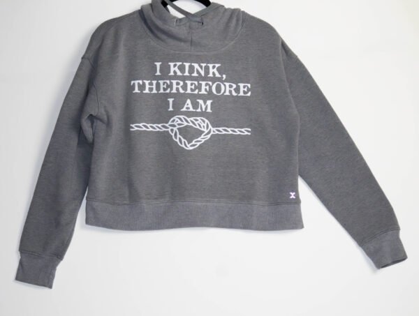 Grey sweatshirt, white language.